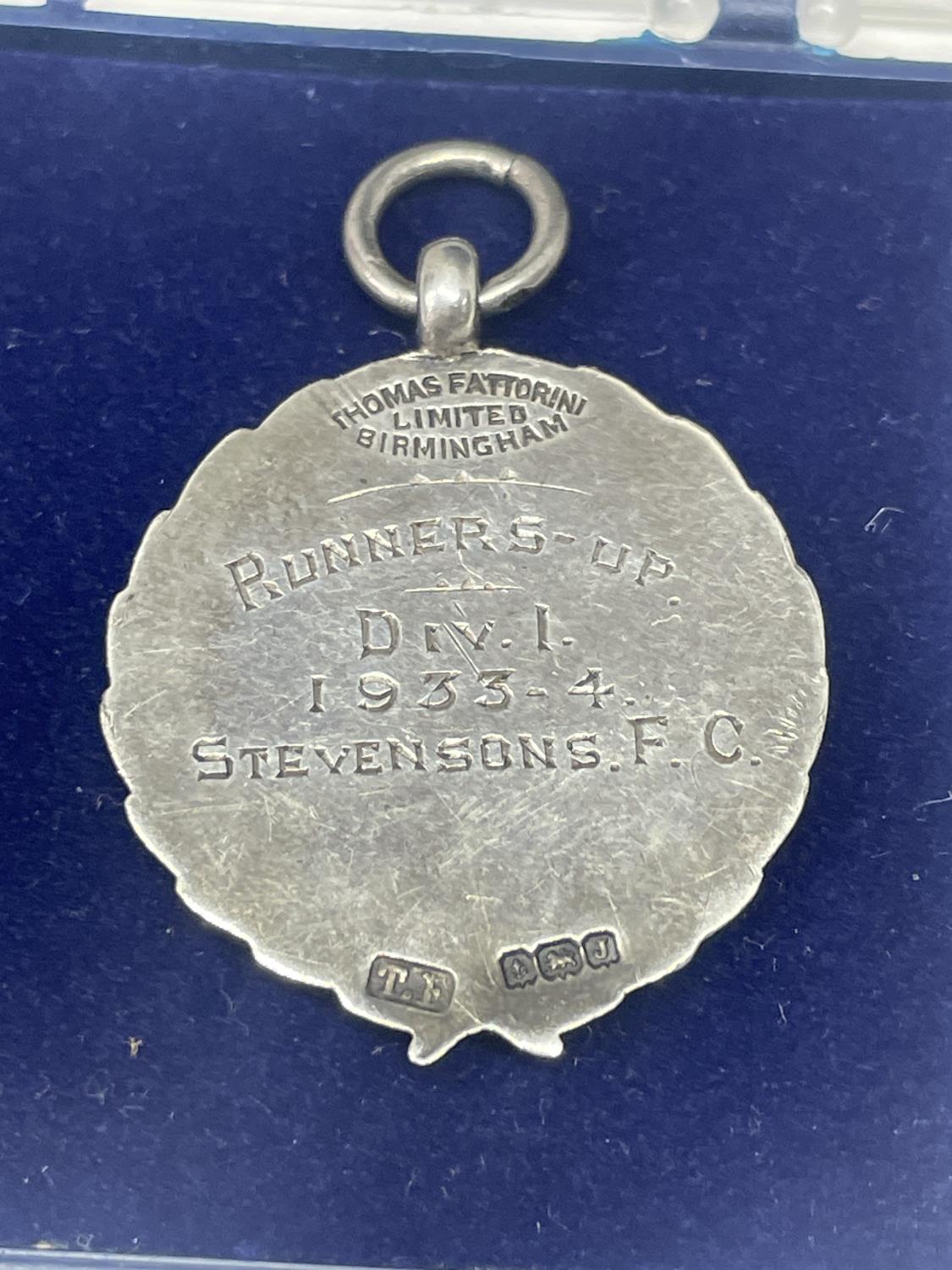 A HALLMARKED BIRMINGHAM SILVER FOOTBALL MEDAL IN A PRESENTATION BOX - Image 2 of 2