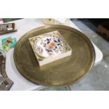 A MIDDLE EASTERN BRASS TRAY - 57 CM DIAMETER TOGETHER WITH A BOXED IMARI STYLE PLATE