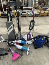 AN ASSORTMENT OF VARIOUS VACUUM CLEANERS