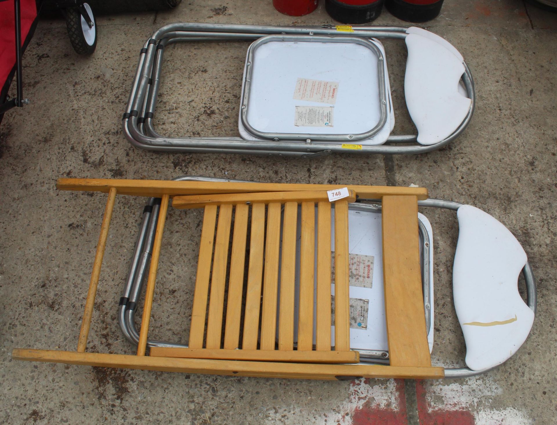 4 FOLD AWAY CHAIRS AND 6 FIRE EXTINGUISHERS IN WORKING ORDER NO VAT