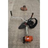 STIHL STRIMMER AND HARNESS IN WORKING ORDER NO VAT