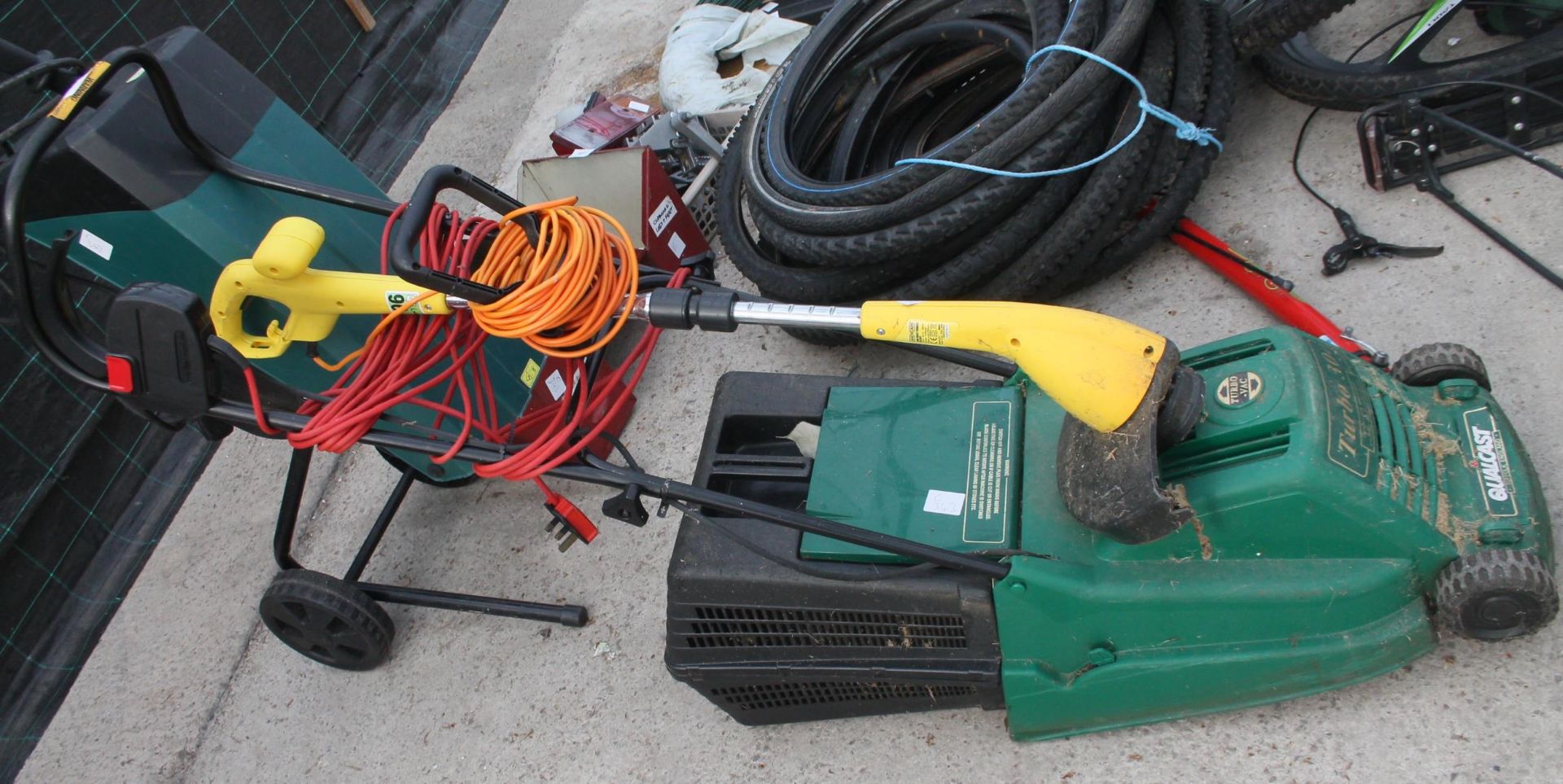 ELECTRIC BUSH SHREDDER AND ELECTRIC MOWER/STRIMMER IN WORKING ORDER NO VAT