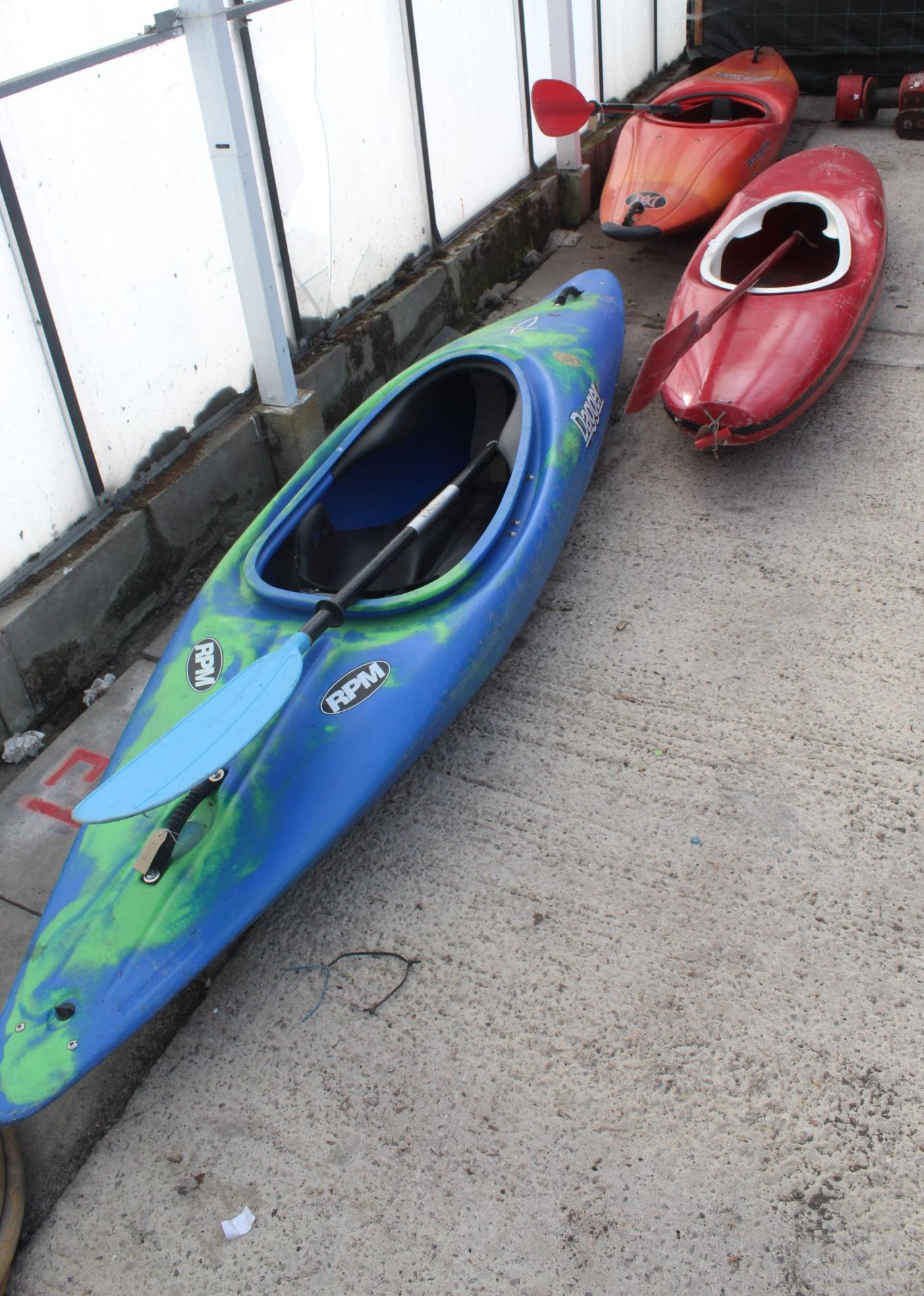 RED CANOE WITH PADDLE, BLUE DAGGER CANOE KAYAK WITH PADDLE, WHIPLASH PERCEPTION ORANGE CANOE KAYAK