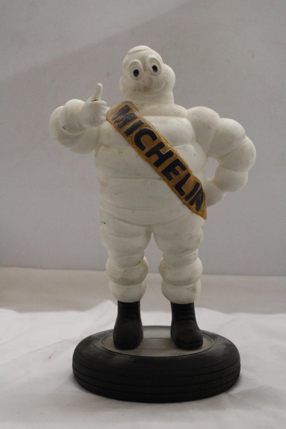 A VINTAGE ORIGINAL MICHELIN MAN ON TYRE APPROXIMATELY 33 CM HIGH - Image 2 of 5