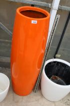 A TALL ORANGE CIRCULAR FIBRE GLASS PLANTER (H:100CM)