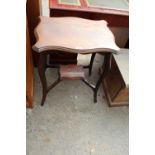 AN EDWARDIAN MAHOGANY TWO TIER CENTRE TABLE, 24" X 17"