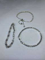 THREE SILVER BRACELETS