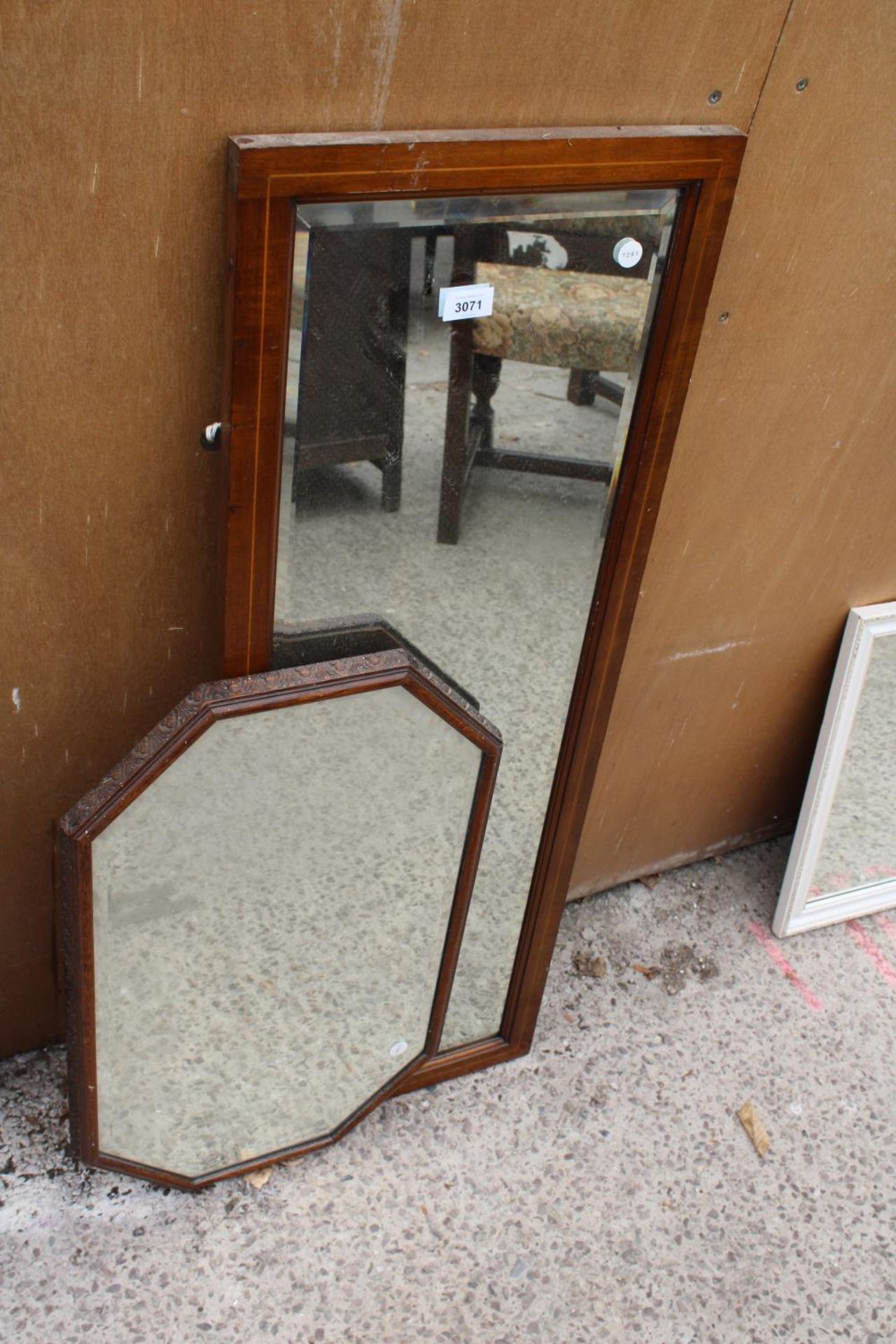 AN OAK OCTAGONAL MIRROR AND AN INLAID MAHOGANY MIRROR