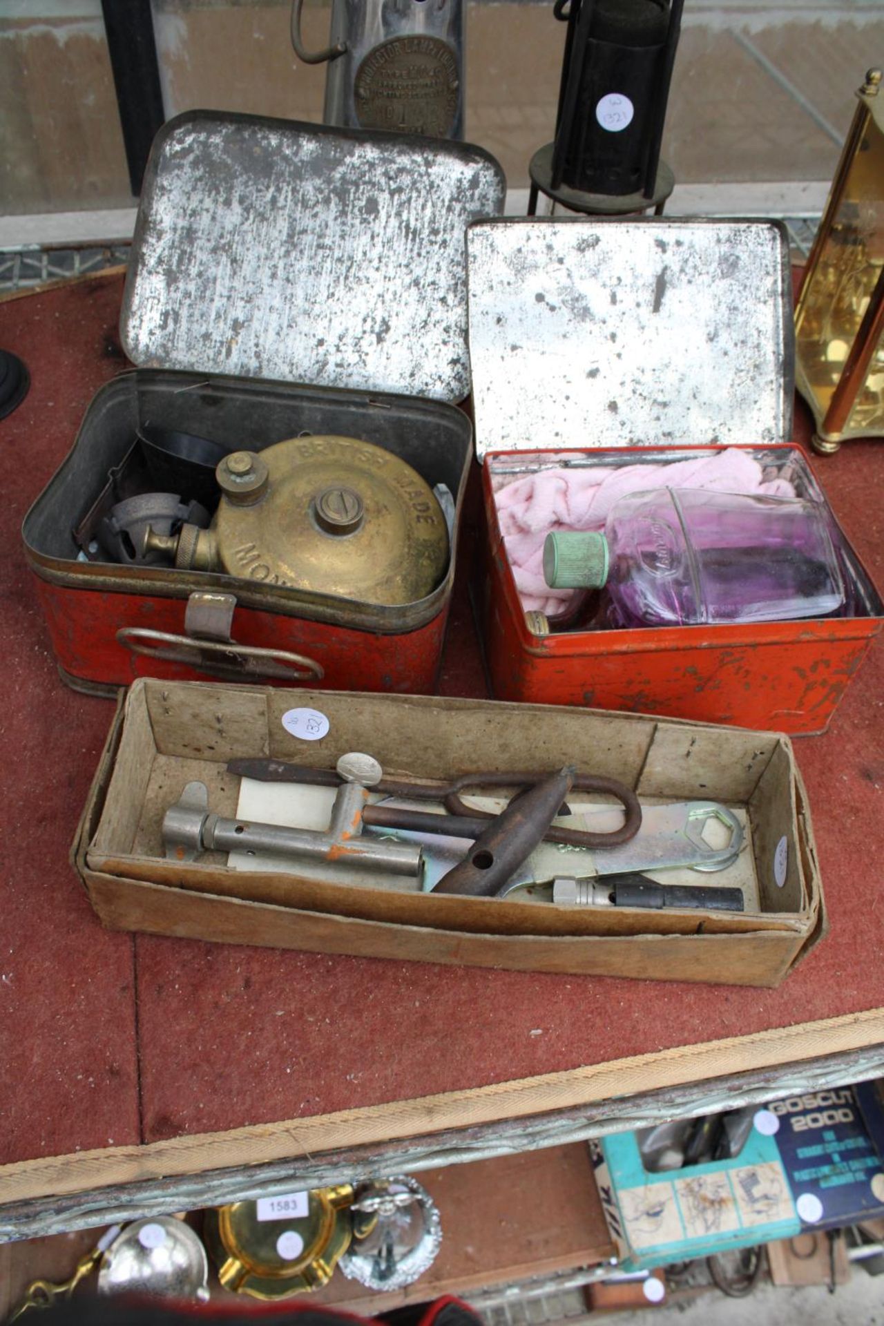 A VINTAGE CAMPING STOVE, METHOLATED SPIRITS AND ACCESSORIES ETC