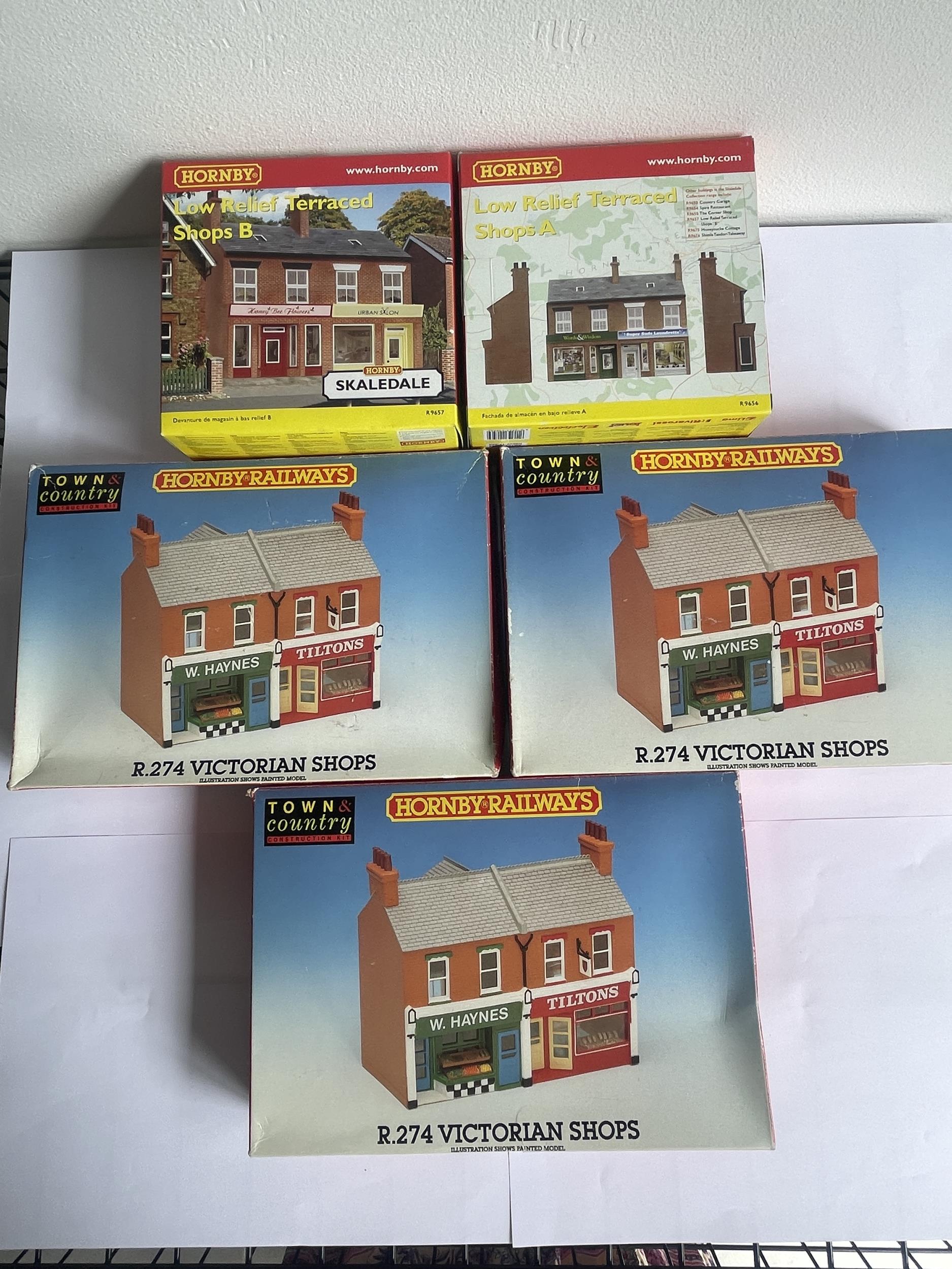 FIVE BOXED HORNBY 00 GAUGE MODEL BUILDING KITS TO INCLUDE THREE VICTORIAN SHOPS AND LOW RELIEF