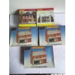 FIVE BOXED HORNBY 00 GAUGE MODEL BUILDING KITS TO INCLUDE THREE VICTORIAN SHOPS AND LOW RELIEF