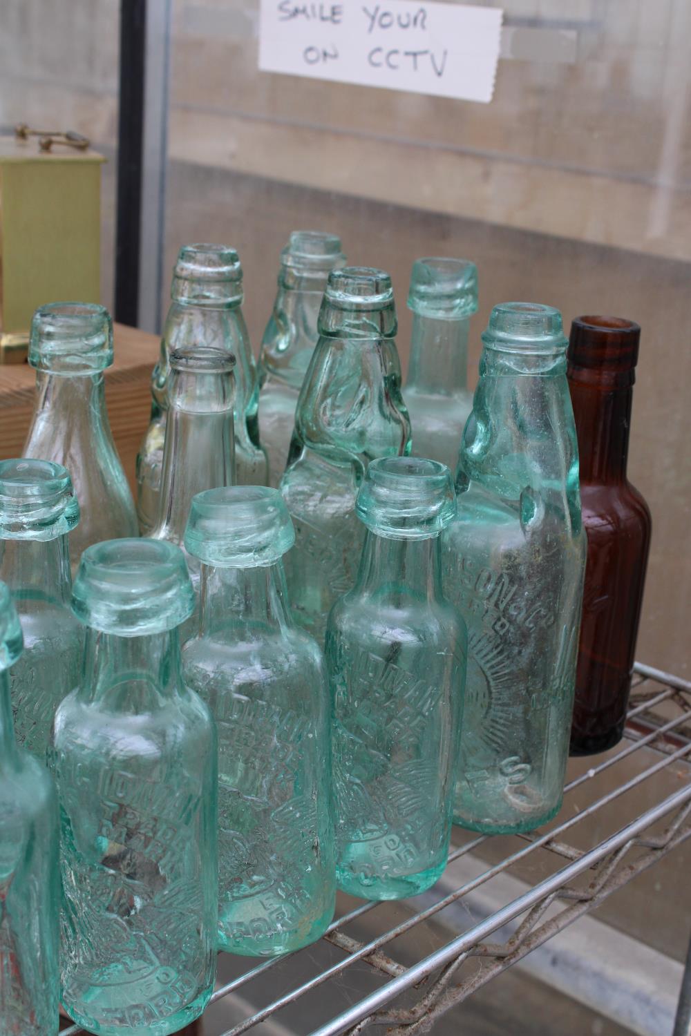 A LARGE ASSORTMENT OF VINTAGE GLASS BOTTLES BEARING VARIOUS LOCAL LOCATIONS TO INCLUDE KNUTSFORD, - Image 2 of 3