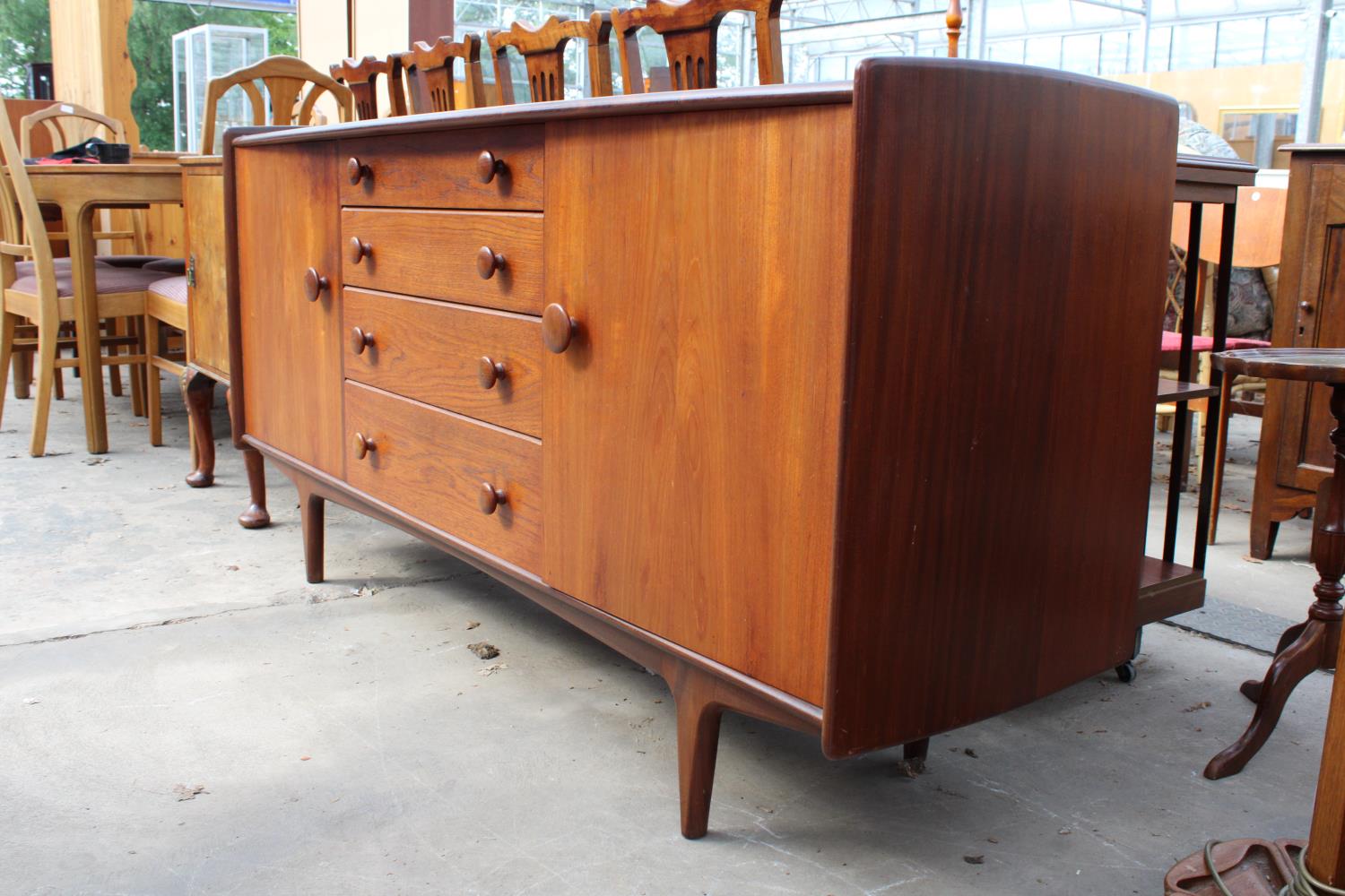 AN A YOUNGER LTD RETRO TEAK SIDEBOARD ENCLOSING TWO CUPBOARDS, FOUR DRAWERS, 66" WIDE - Image 7 of 7