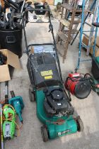 A POWER BASE PETROL LAWN MOWER WITH GRASS BOX