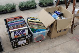 A LARGE ASSORTMENT OF LP RECORDS AND CDS