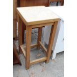 A TALL BEECH FRAMED STOOL