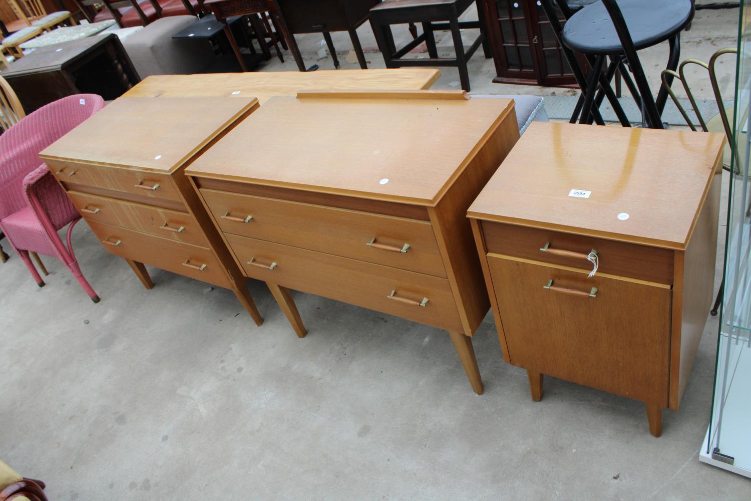 TWO RETRO OAK LEBUS CHESTS OF DRAWERS AND A BEDSIDE LOCKER