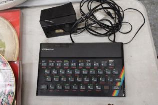 A SINCIAIR ZX SPECTRUM WITH POWER SUPPLY