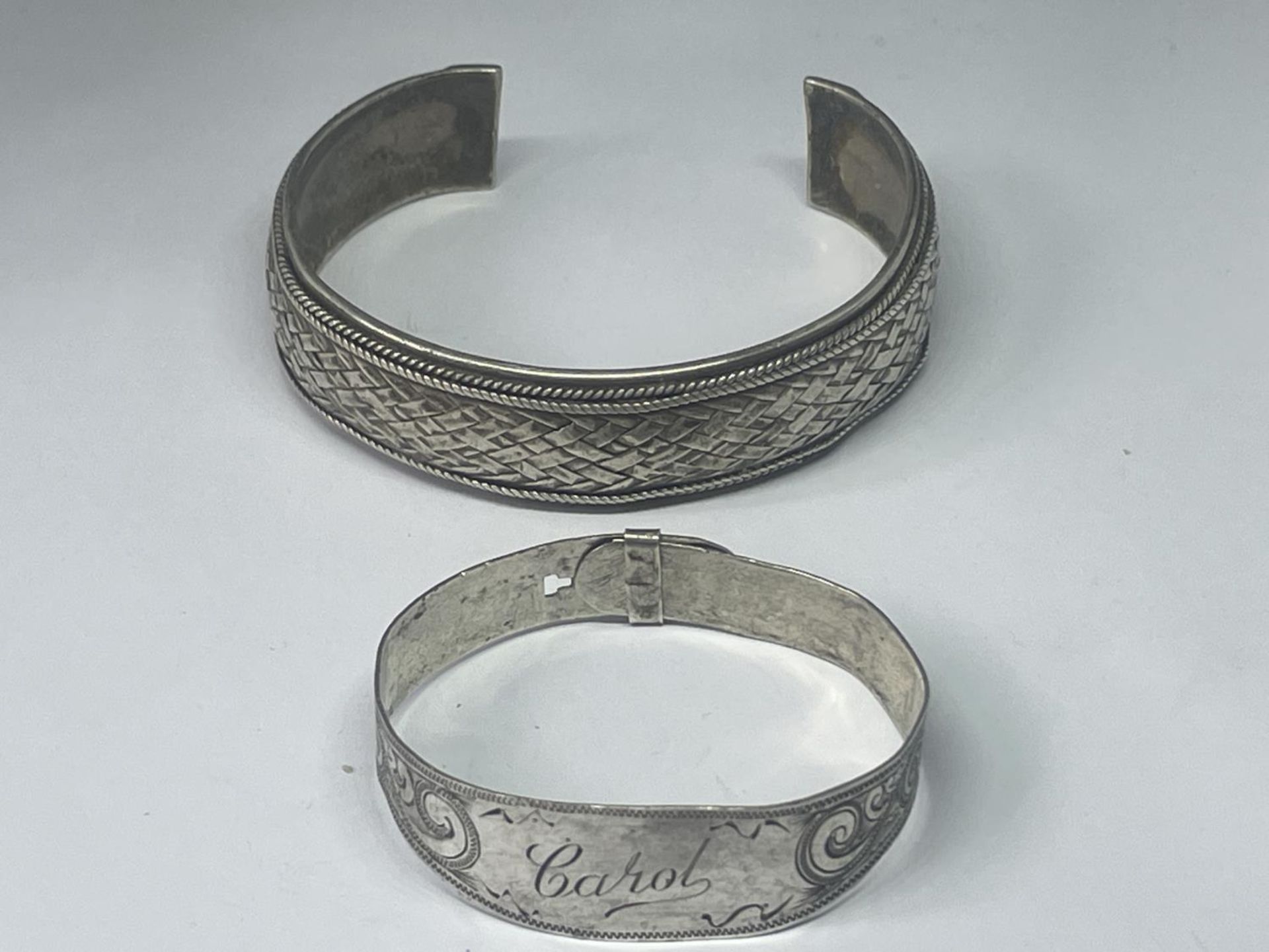 TWO SILVER BANGLES