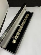 A THREE PENCE SILVER COIN BRACELET IN A PRESENTATION BOX