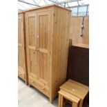 A MODERN PINE TWO DOOR WARDROBE WITH DRAWER TO BASE, 36" WIDE
