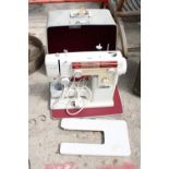 A NEW HOME ELECTRIC SEWING MACHINE WITH FOOT PEDAL AND CARRY CASE