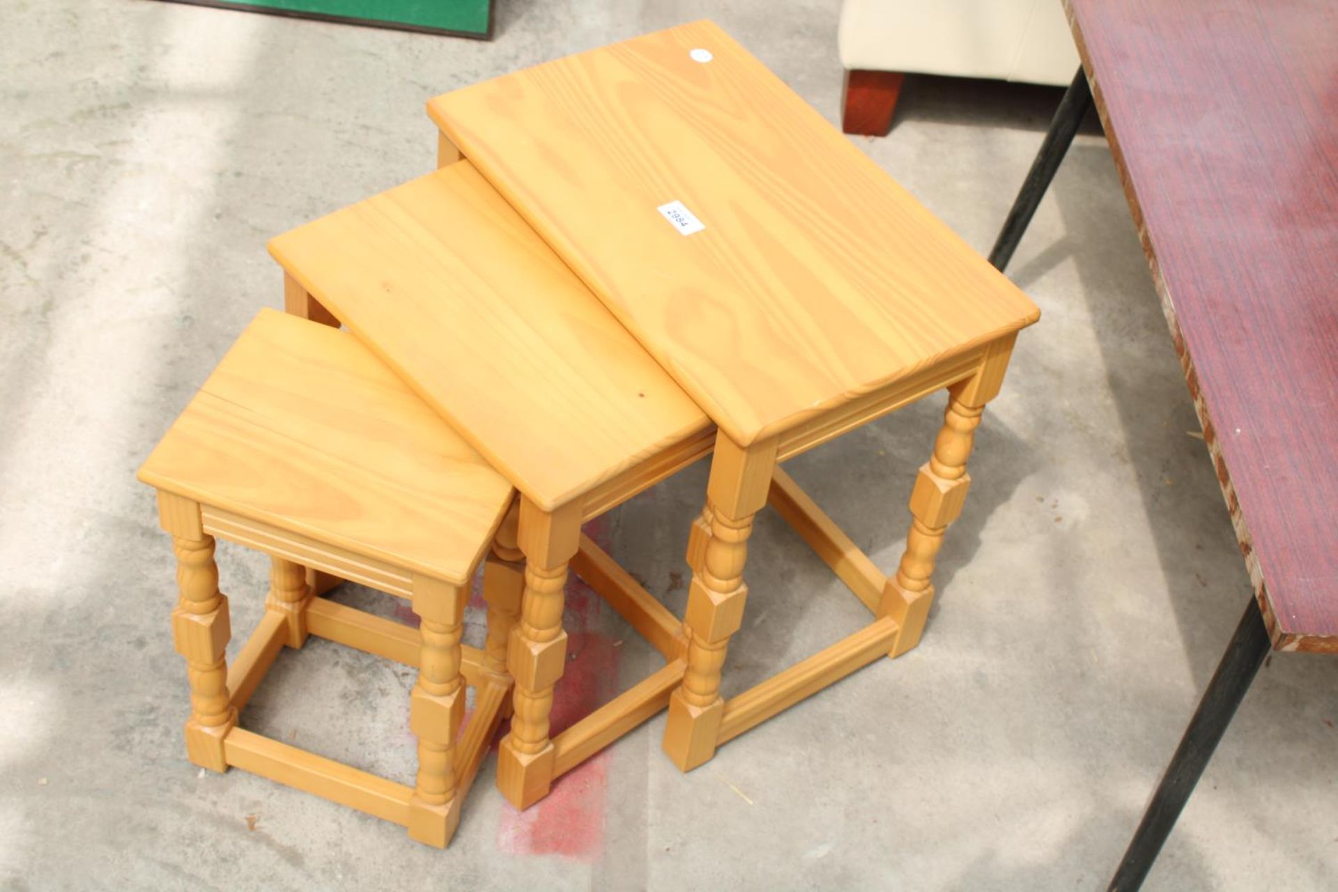 A NEST OF THREE TABLES, OPEN THREE TIER BOOKCASE AND COFFEE TABLE - Image 2 of 3
