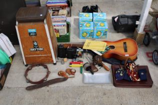 AN ASSORTMENT OF MUSICAL ITEMS TO INCLUDE AN ACOUSTIC GUITAR, A STOOL AND FURTHER INSTRUMENTS ETC