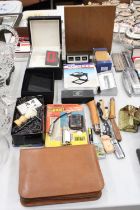 A MIXED LOT TO INCLUDE A GENTLEMAN'S GROOMING KIT, CASED, LIGHTERS, A MAGNIFIER, PENKNIVES, A DESK