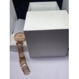 A MICHAEL KORS WRIST WATCH IN ROSE GOLD WITH PRESENTATION BOX (NEEDS BATTERY AND STRAP)