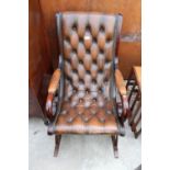 A CHESTERFIELD STYLE MAHOGANY ROCKING CHAIR