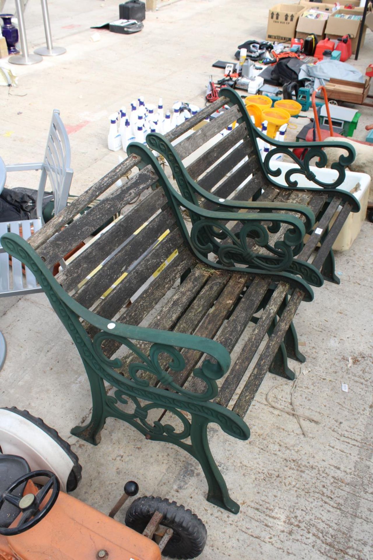 A PAIR OF WOODEN SLATTED GARDEN CHAIRS WITH DECORATIVE CAST ENDS - Image 2 of 2