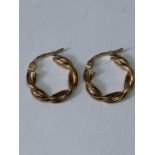 A PAIR OF 9 CARAT GOLD TWISTED HOOP EARRINGS GROSS WEIGHT 1.21 GRAMS