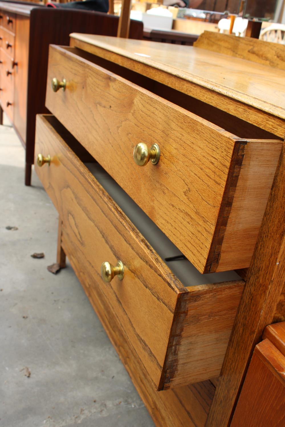 A MID 20TH CENTURY OAK THREE DRAWER DRESSING CHEST WITH TRIPLE MIRROR, 39" WIDE - Image 3 of 3