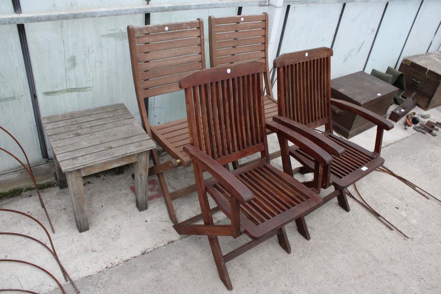 TWO PAIRS OF TEAK FOLDING CHAIRS AND A WOODEN SLATTED TABLE