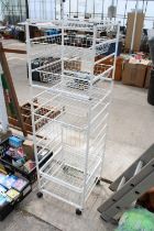 A METAL STORAGE STAND WITH WIRE BASKETS