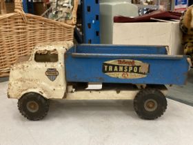 A BLUE AND WHITE TRI-ANG JUNIOR TIP LORRY FOR RESTORATION, THE FRONT GRILL IS PRESENT BUT THE BACK