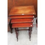 A MAHOGANY 19TH CENTURY STYLE NEST OF FOUR TABLES