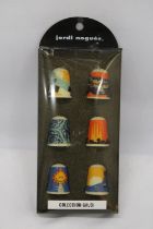 A SET OF SIX SPANISH GRUDI DESIGNED CERAMIC THIMBLES