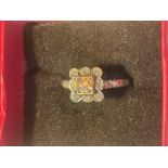 A SILVER AND 9 CARAT GOLD VICTORIAN DRESS RING IN A PRESENTATION BOX