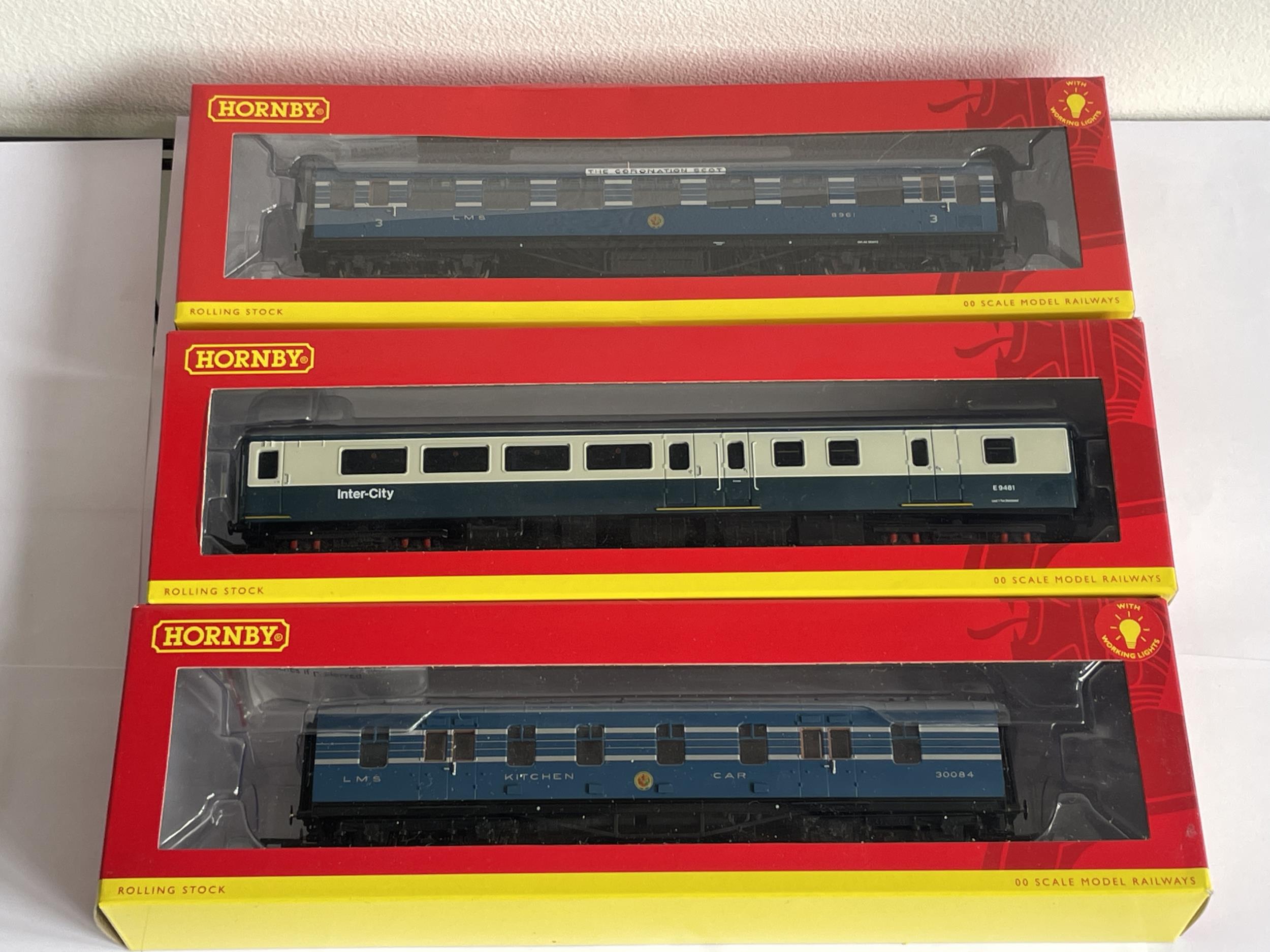 THREE BOXED HORNBY 00 GAUGE CARRIAGES TO INCLUDE A BRAKE STANDARD OPEN, AN LMS STANIER CORONATION