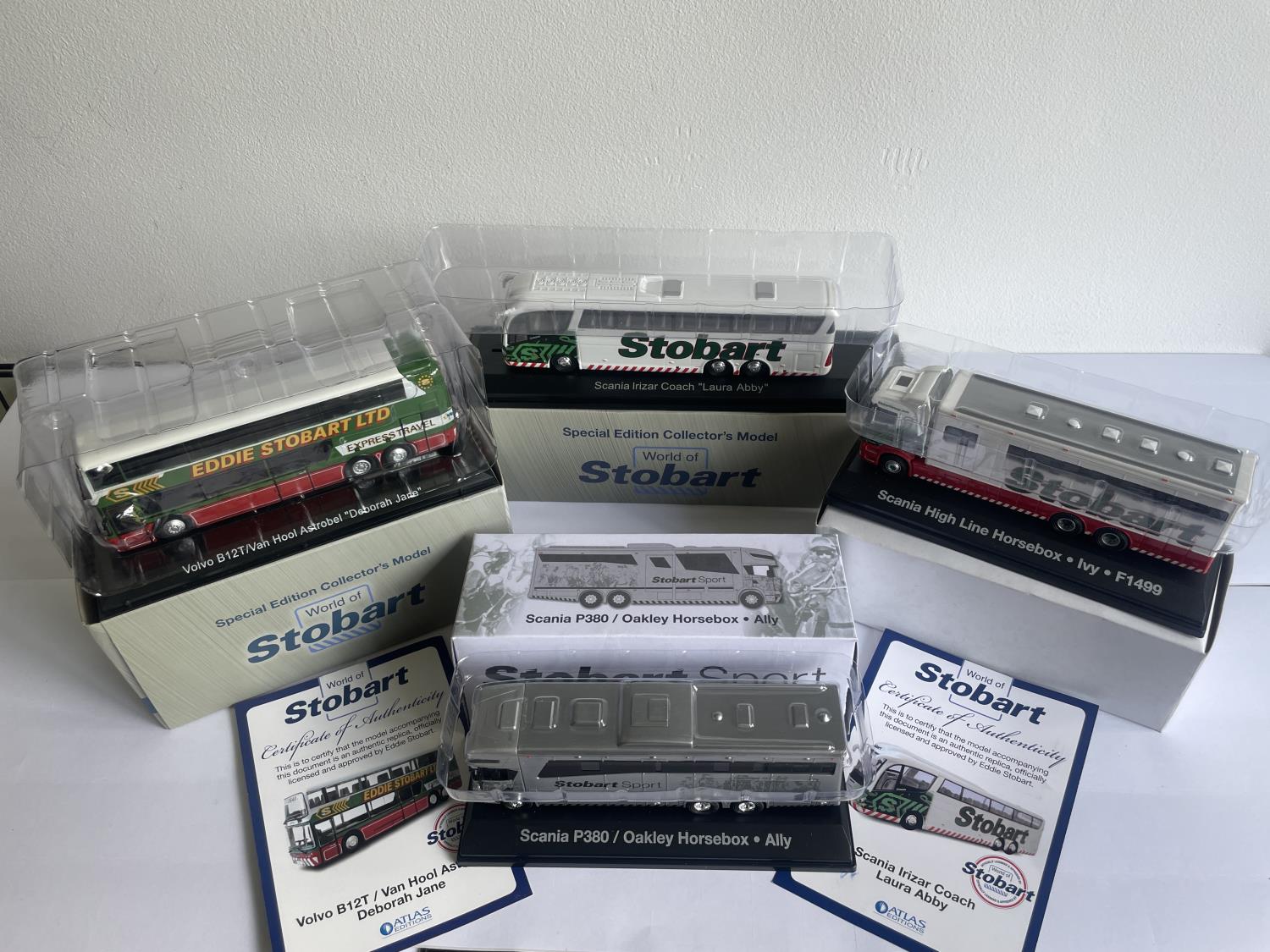 FOUR BOXED STOBART VEHICLES TO INCLUDE TWO COACHES (WITH COA) AND TWO HORSE BOXES