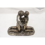 A HEAVY EROTIC STATUETTE ON BASE - APPROXIMATELY 27CM HIGH