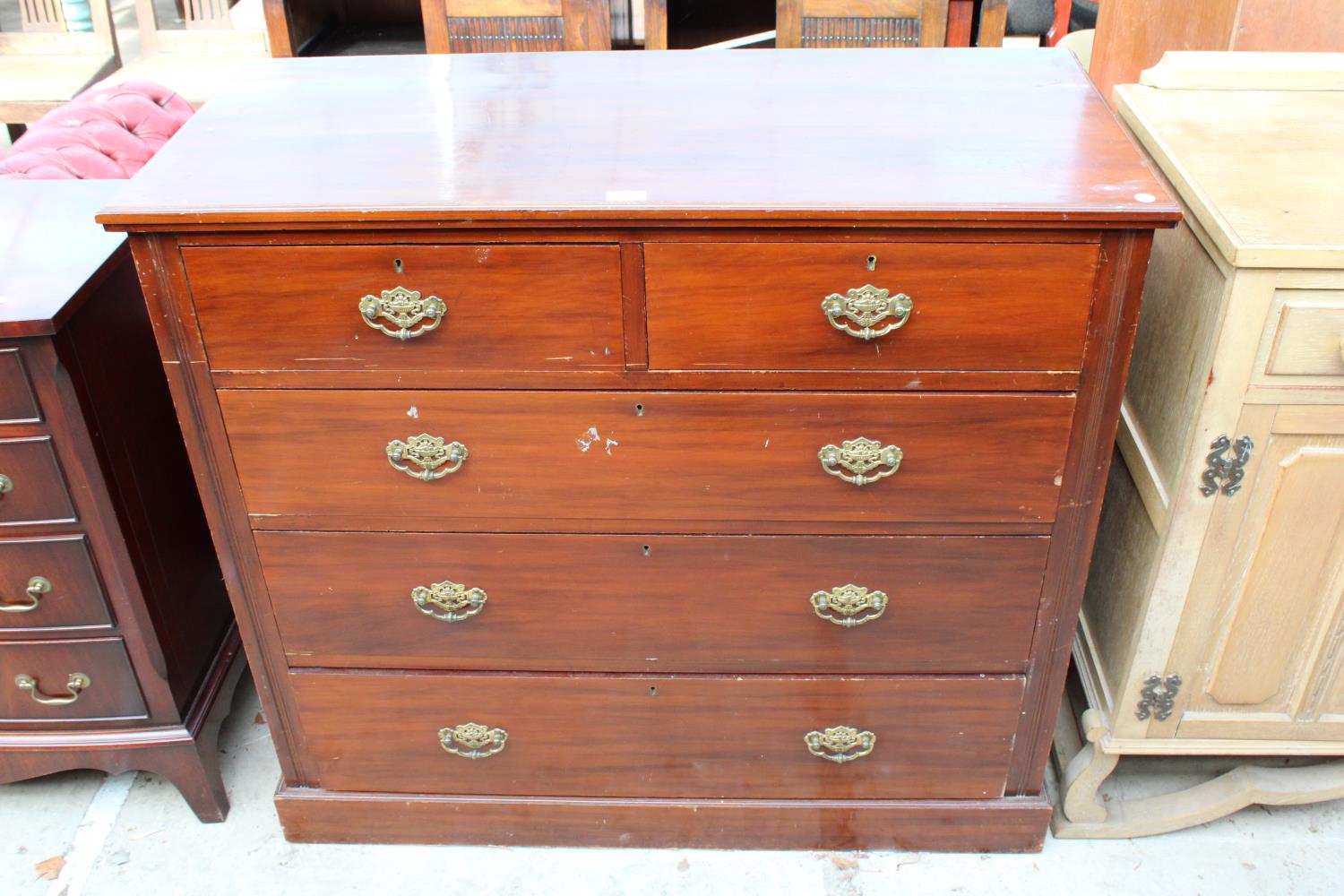 A LATE VICTORIAN MAHOGANY CHEST OF TWO SHORT AND THREE LONG GRADUATED DRAWERS, 42" WIDE