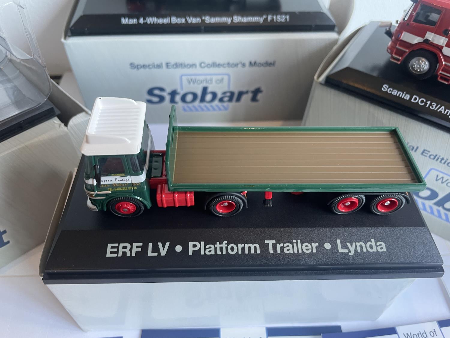 FOUR BOXED STOBART VEHICLES TO INCLUDE A UNIMOG, FIRE ENGINE AND TWO WAGONS THREE WITH COA - Image 5 of 7