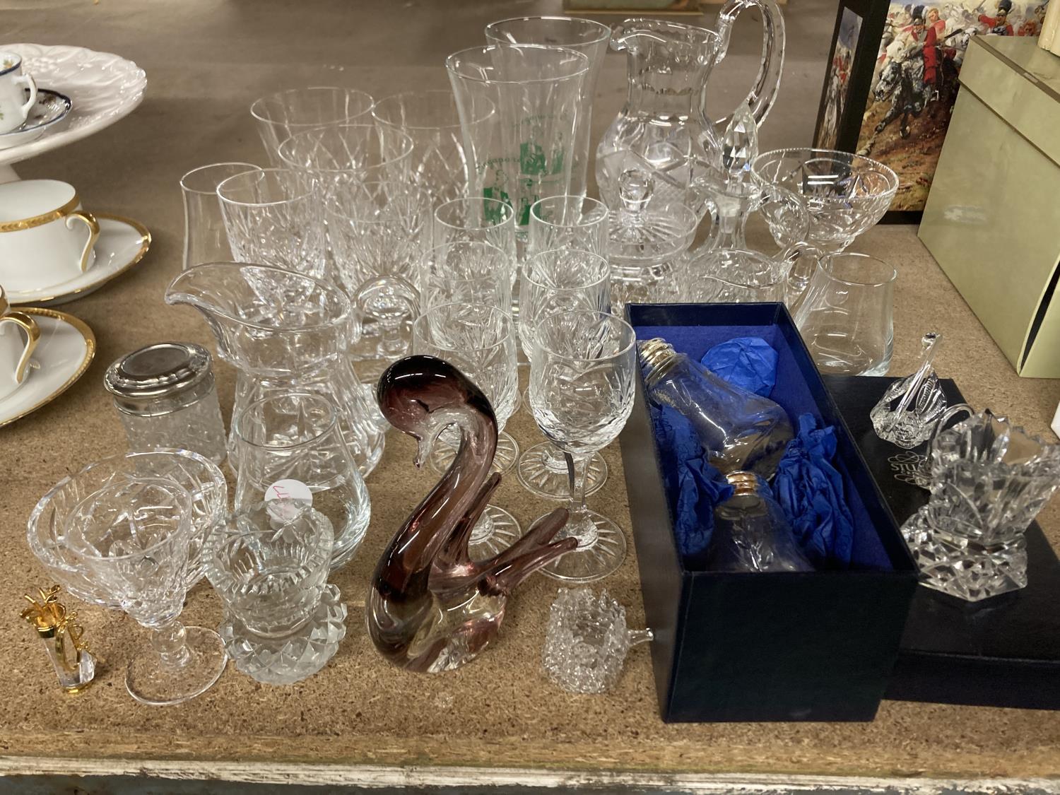 A QUANTITY OF GLASSWARE TO INCLUDE SHERRY AND PORT GLASSES, TUMBLERS, PRESERVE POT, JUGS, SWANS, ETC