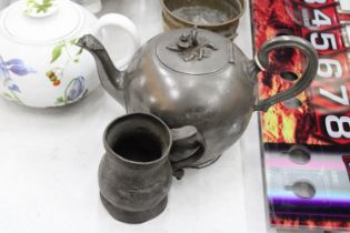 A GEORGIAN PEWTER TEAPOT AND A 14TH CENTURY PEWTER MUG