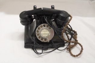 A VINTAGE BAKELITE TELEPHONE WITH BOTTOM DRAWER, RECEIVER A/F