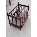 A VICTORIAN STYLE FOUR DIVISION CANTERBURY MAGAZINE RACK