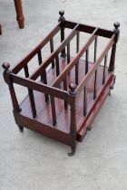 A VICTORIAN STYLE FOUR DIVISION CANTERBURY MAGAZINE RACK